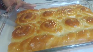 Braided Coconut and cardamom bread (maandazi ya kusuka)